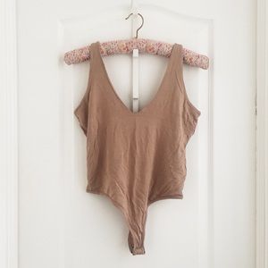 Naked Wardrobe “I Got The Scoop” Bodysuit